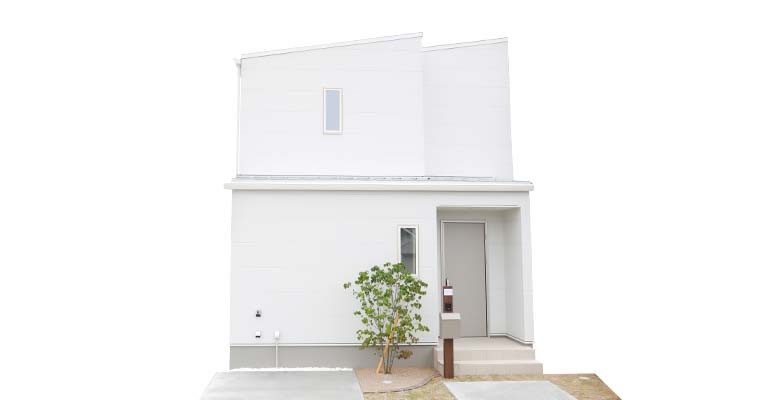 まっ白な壁が印象的な家